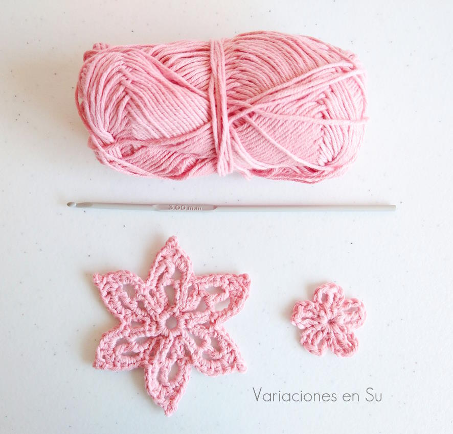 Pink crocheted flowers.